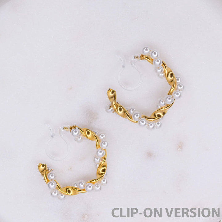 Twist pearl design hoop clip on earrings in gold with hypoallergenic invisible clear resin clip