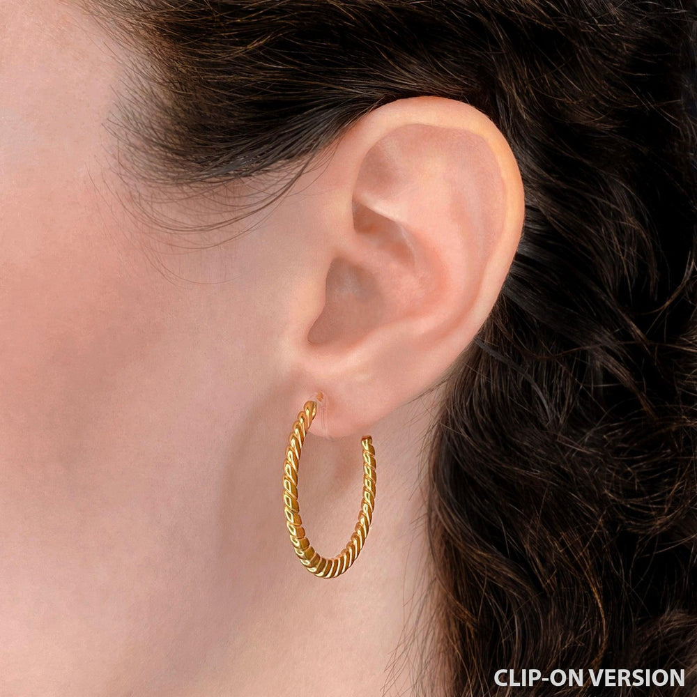 Flat twist hoop clip on earrings in gold