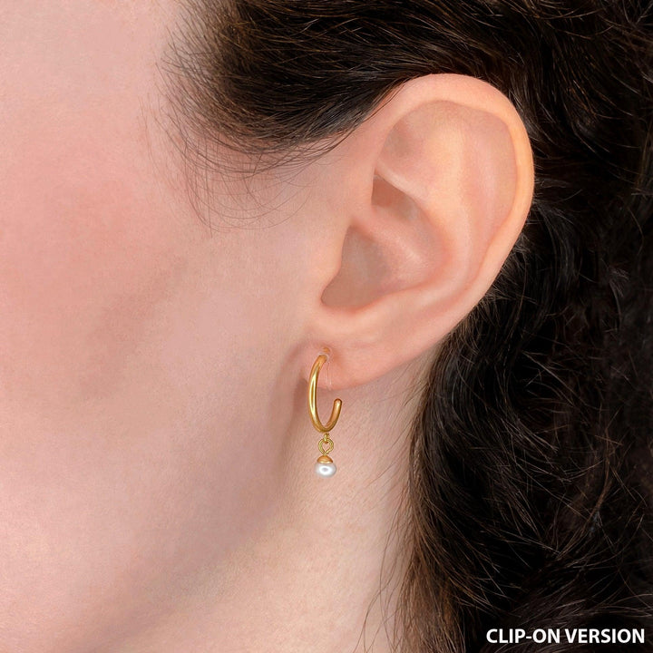 Thin huggie hoop clip on earrings in gold with round real genuine freshwater pearl dangle worn on ear