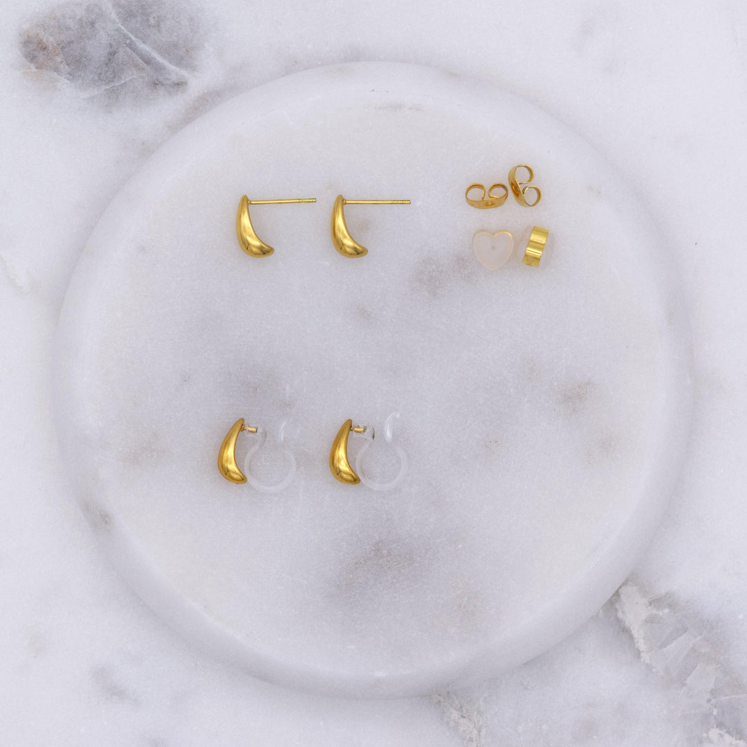 Teardrop huggie stud clip on earrings in gold and pierced earrings side by side for comparison