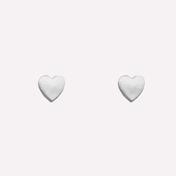 Mini heart stud clip on earrings in silver