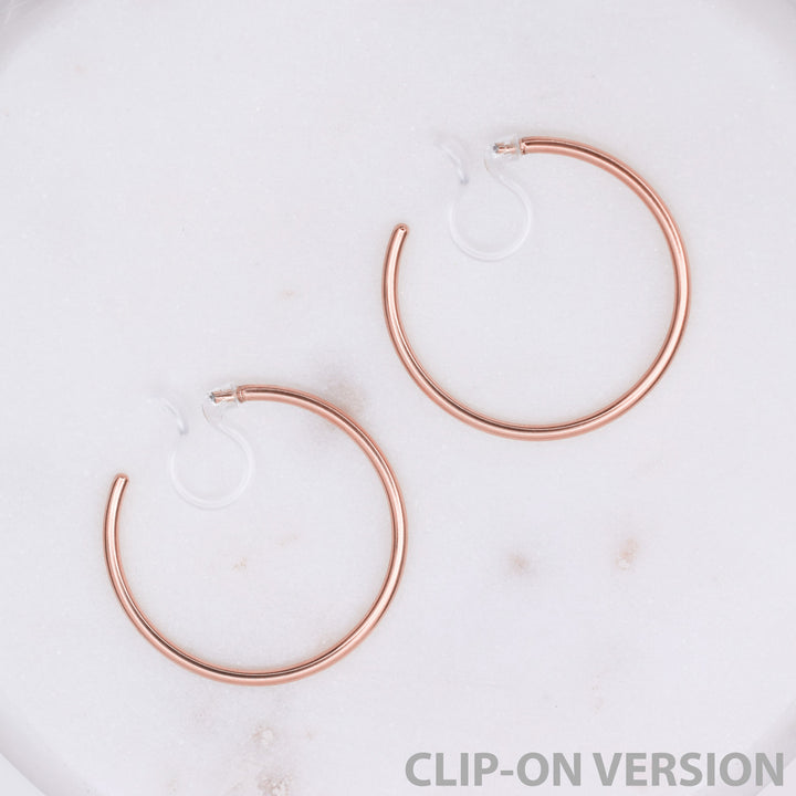 Thin medium hoop clip on earrings in rose gold
